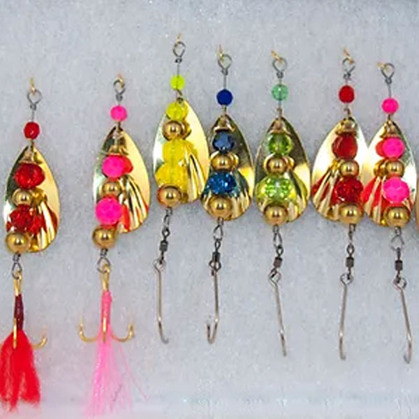 Colorful fishing spinners with beads and hooks